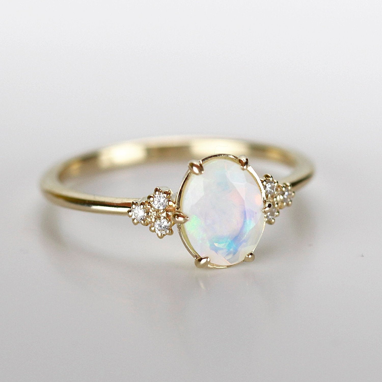oval opal engagement ring diamonds