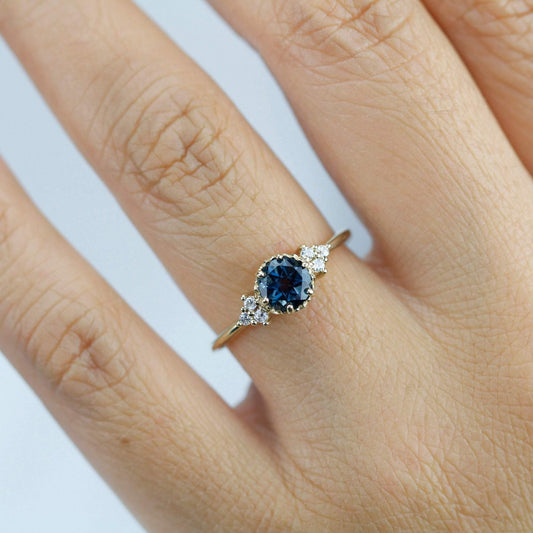 Delicate cluster engagement ring London Blue Topaz and diamonds - NOOI JEWELRY
