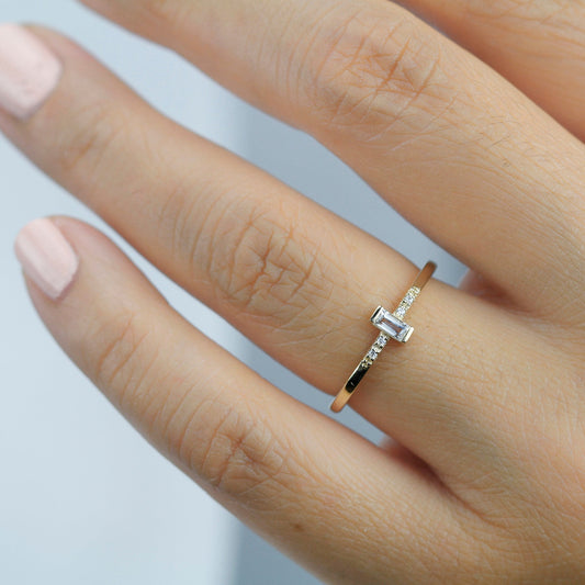 simple baguette ring with side stones | white topaz and diamond engagement ring - NOOI JEWELRY