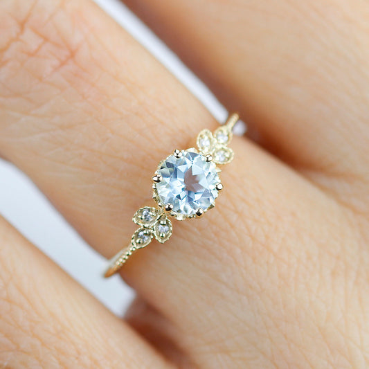Sky blue topaz engagement ring vintage, marquise diamond setting on the side - NOOI JEWELRY