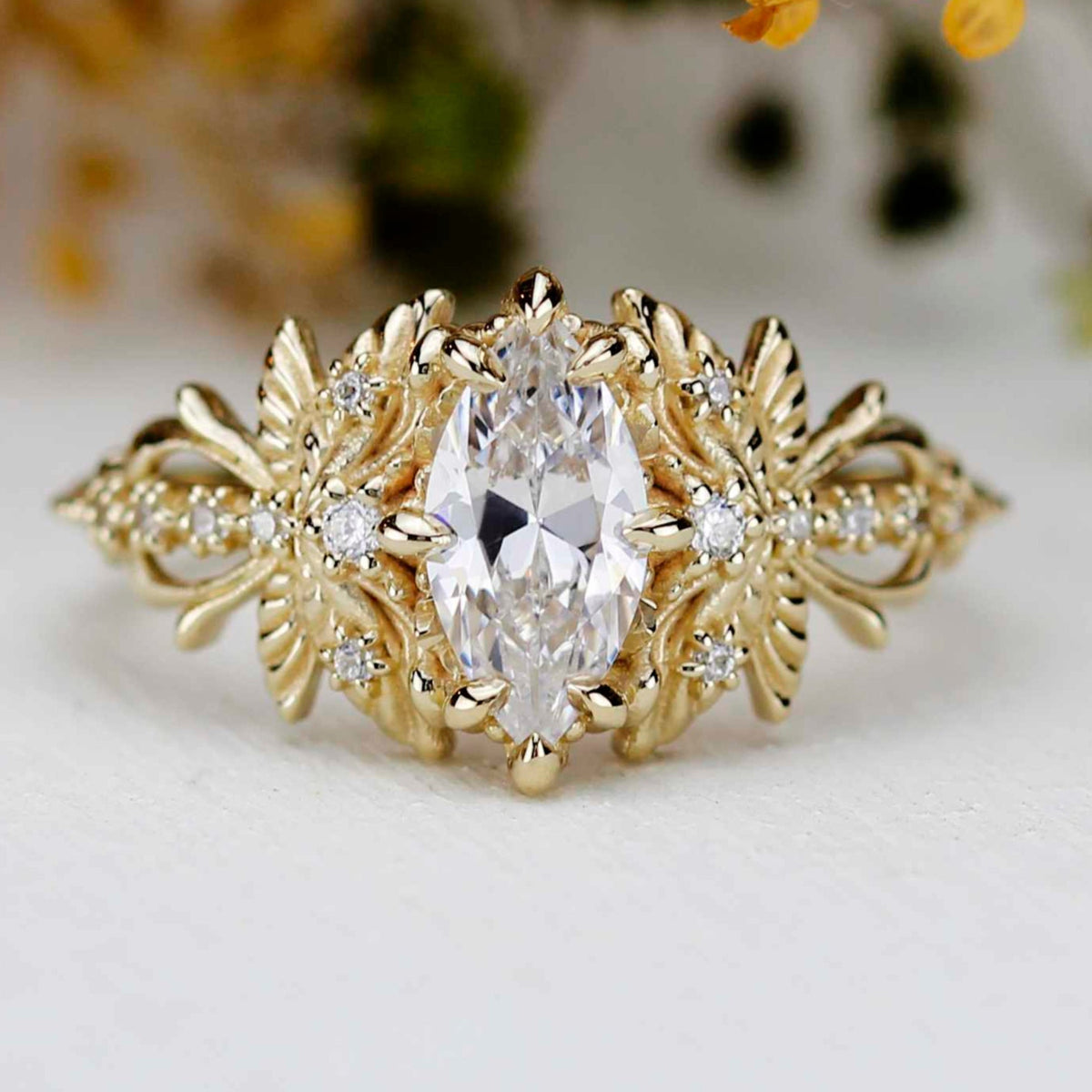 18k gold dragonfly ring with a 1 carat, 10x5 mm marquise lab grown diamond