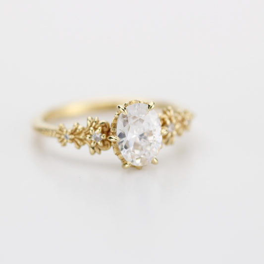 18k gold baroque ring with a 1 carat, 8x6 mm oval lab grown diamond