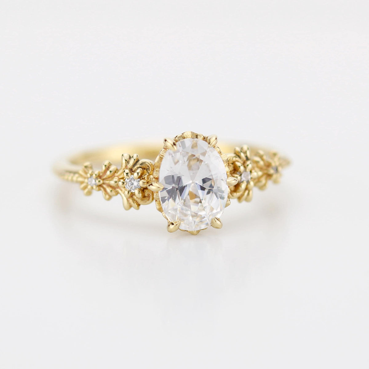 18k gold baroque ring with a 1 carat, 8x6 mm oval lab grown diamond