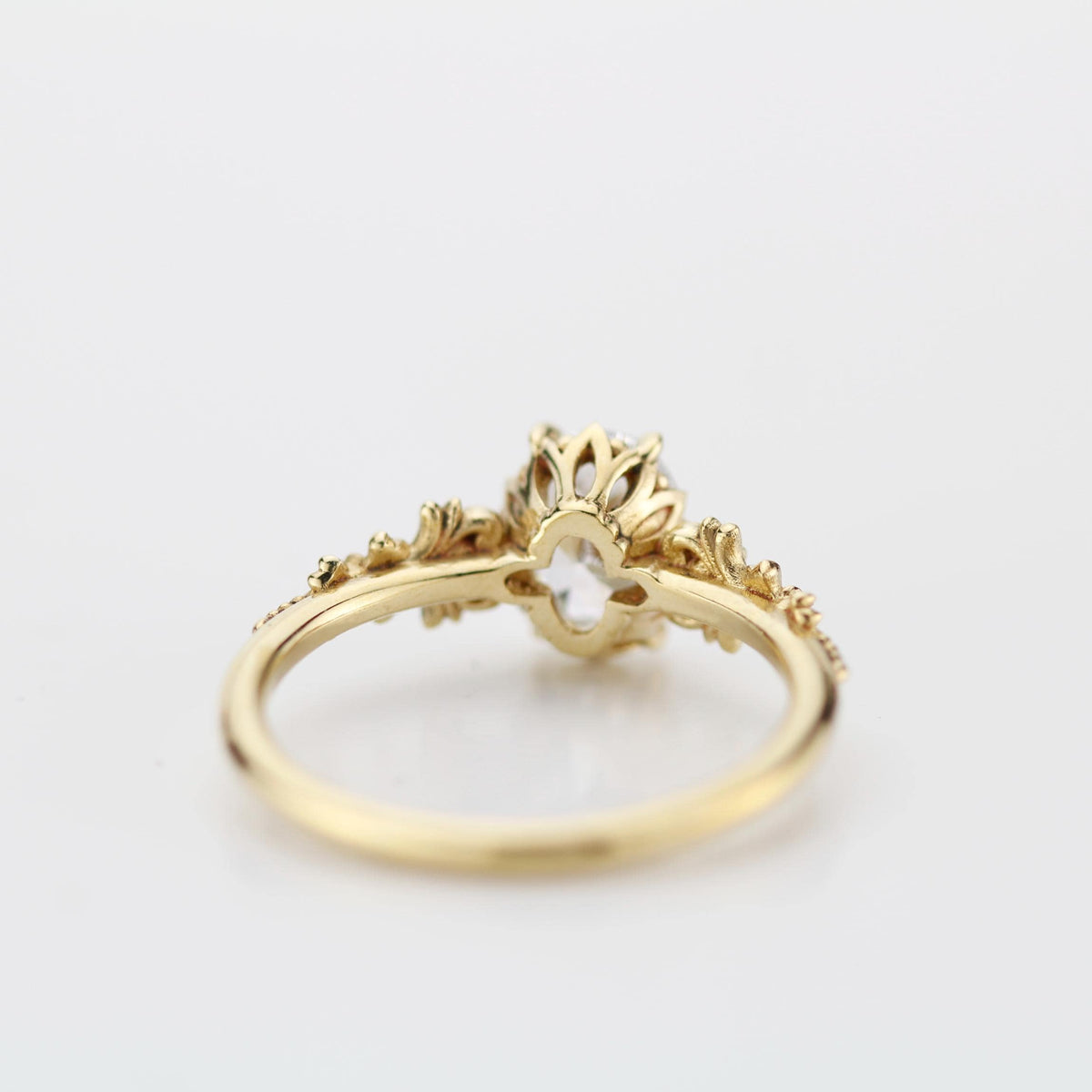 18k gold baroque ring with a 1 carat, 8x6 mm oval lab grown diamond