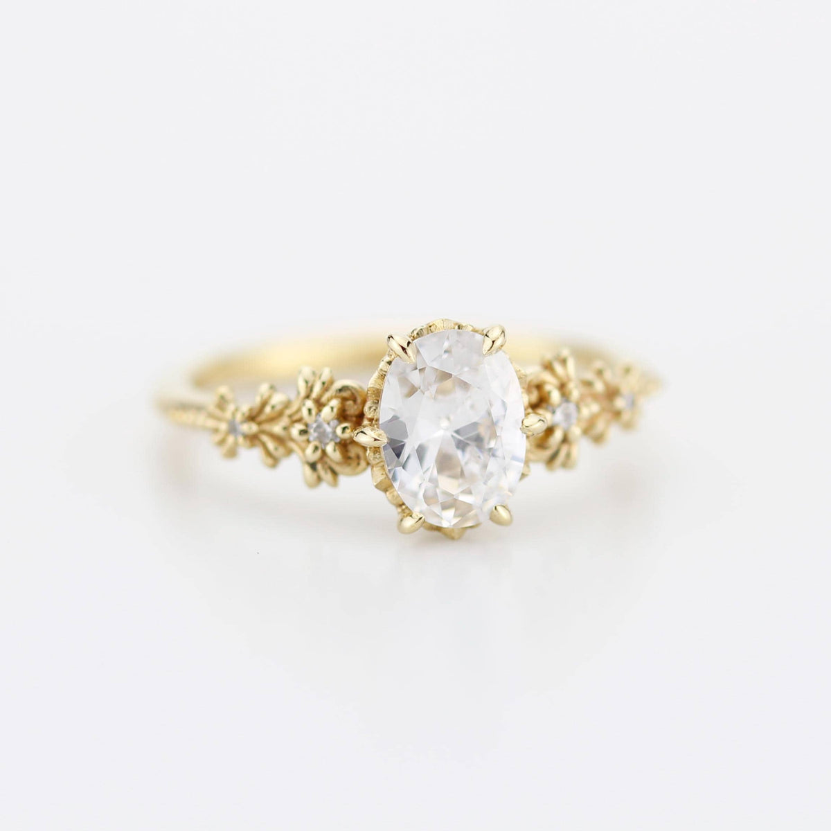 18k gold baroque ring with a 1 carat, 8x6 mm oval lab grown diamond