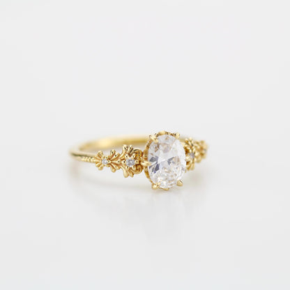 18k gold baroque ring with a 1 carat, 8x6 mm oval lab grown diamond