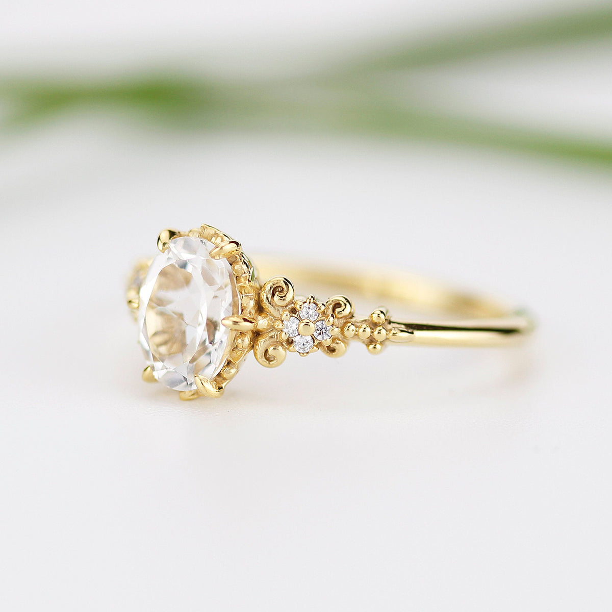 18k gold vintage ring with a 1 carat oval lab grown diamond, three-quarter view