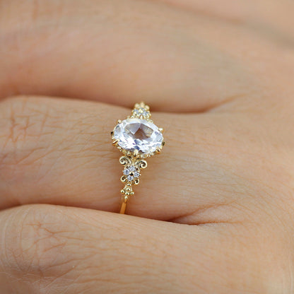 18k gold vintage ring with a 1 carat oval lab grown diamond, worn on the hand