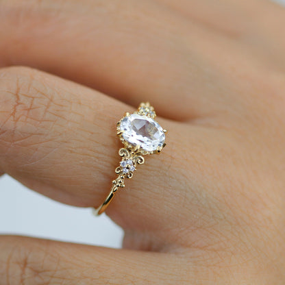 18k gold vintage ring with a 1 carat oval lab grown diamond, worn on the hand