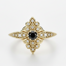 Load image into Gallery viewer, Intricate 18k yellow gold statement ring featuring a round-cut black diamond center stone, surrounded by a vintage-style filigree marquise setting and sparkling white diamond accents.