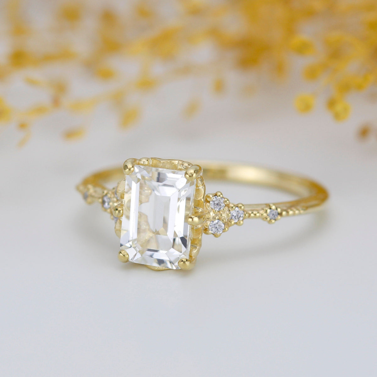 18k gold ring with a 2 carat, 8x6 mm emerald cut lab grown diamond