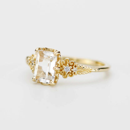 18k gold vintage floral ring with an emerald cut lab grown diamond, profile view