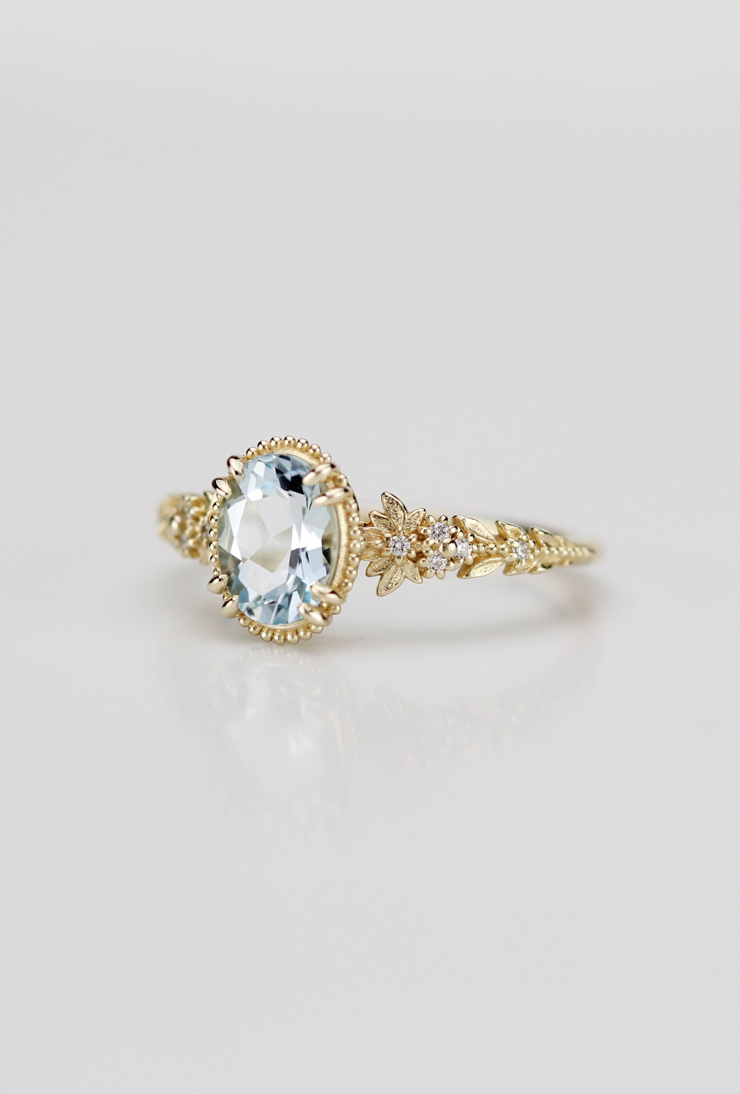 Anthea - 18k Gold Oval Aquamarine Engagement Ring with Diamond Floral Band