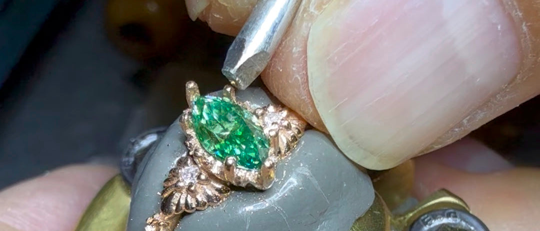 Handmade ring being set at the bench