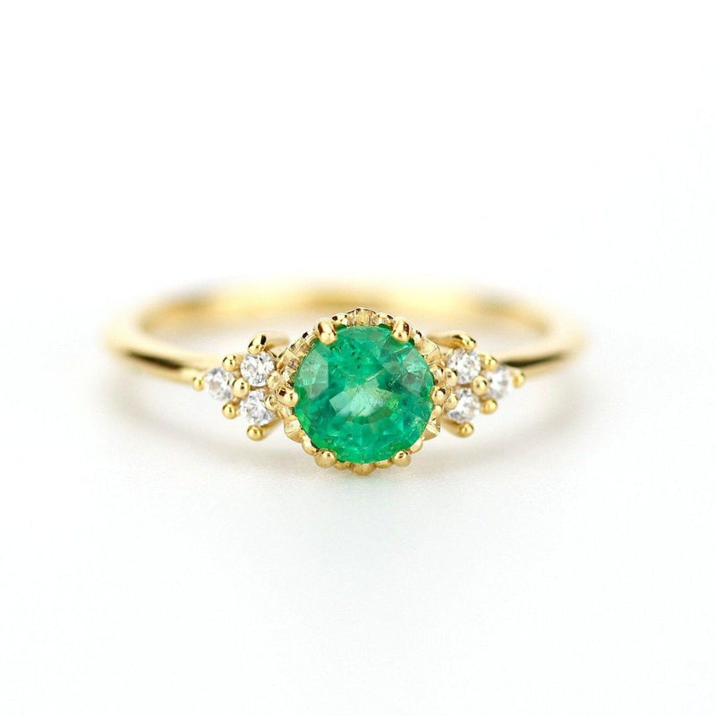 Round emerald cluster ring, from the emerald collection