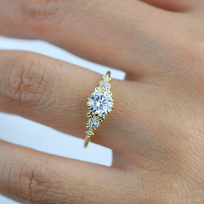 18k gold baroque cluster ring with a 0.8 carat round lab grown diamond