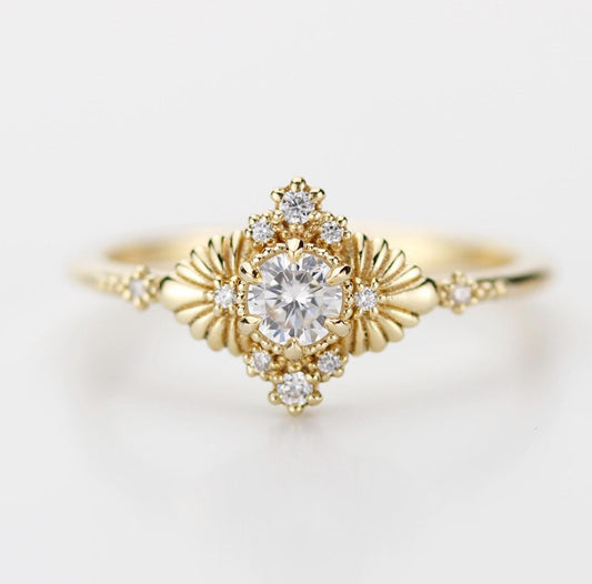 Vintage white diamond ring in 18k yellow gold with art deco leaf design, perfect for engagement or anniversary, antique-inspired elegant gemstone ring