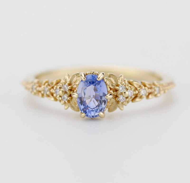 Light blue oval sapphire leaf ring, from the sapphire collection