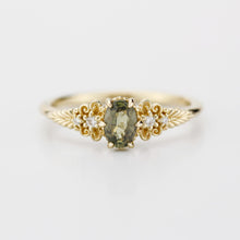 Load image into Gallery viewer, A vintage-inspired 18K gold ring featuring a olive green sapphire, accented with delicate filigree details and natural diamonds, creating an antique-style engagement or heirloom ring.