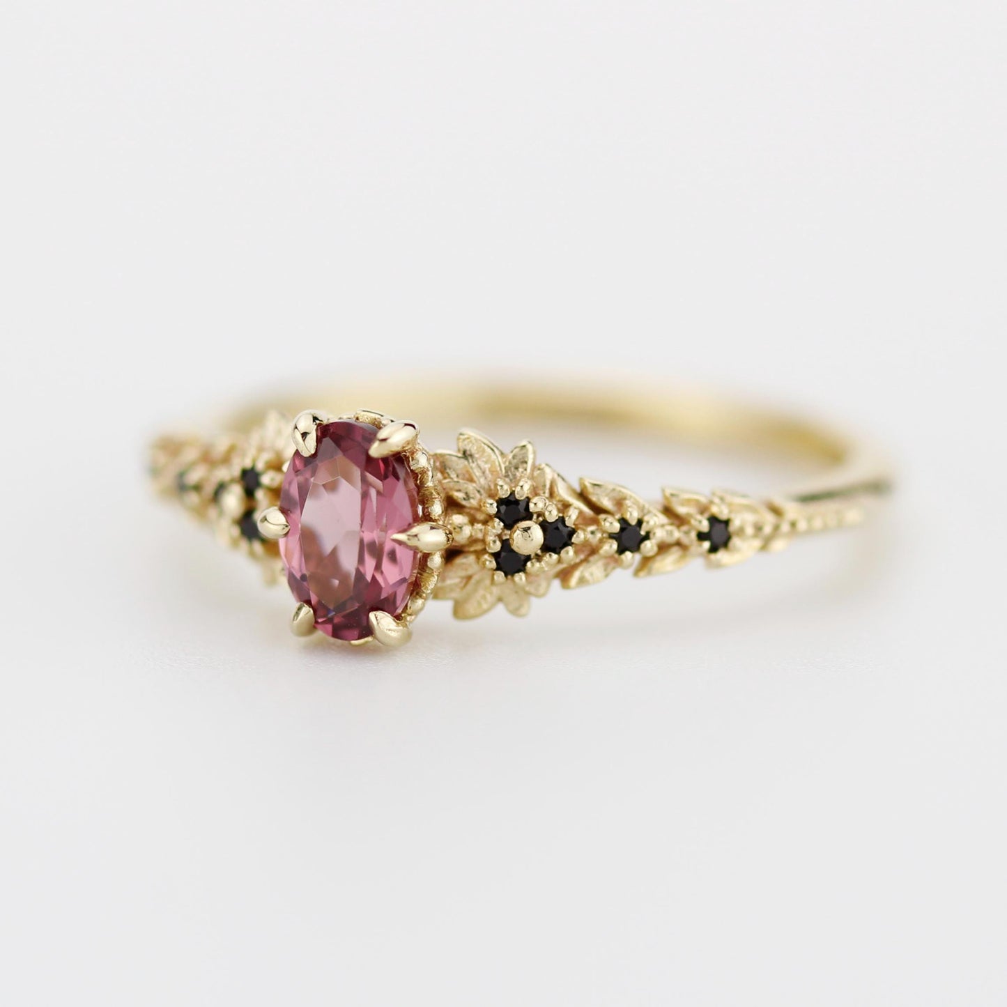 Rhodolite Garnet Engagement Ring in 18k Gold, Black Diamond Leaf Band, Oval Garnet Petal Setting, Handmade Nature-Inspired Jewelry