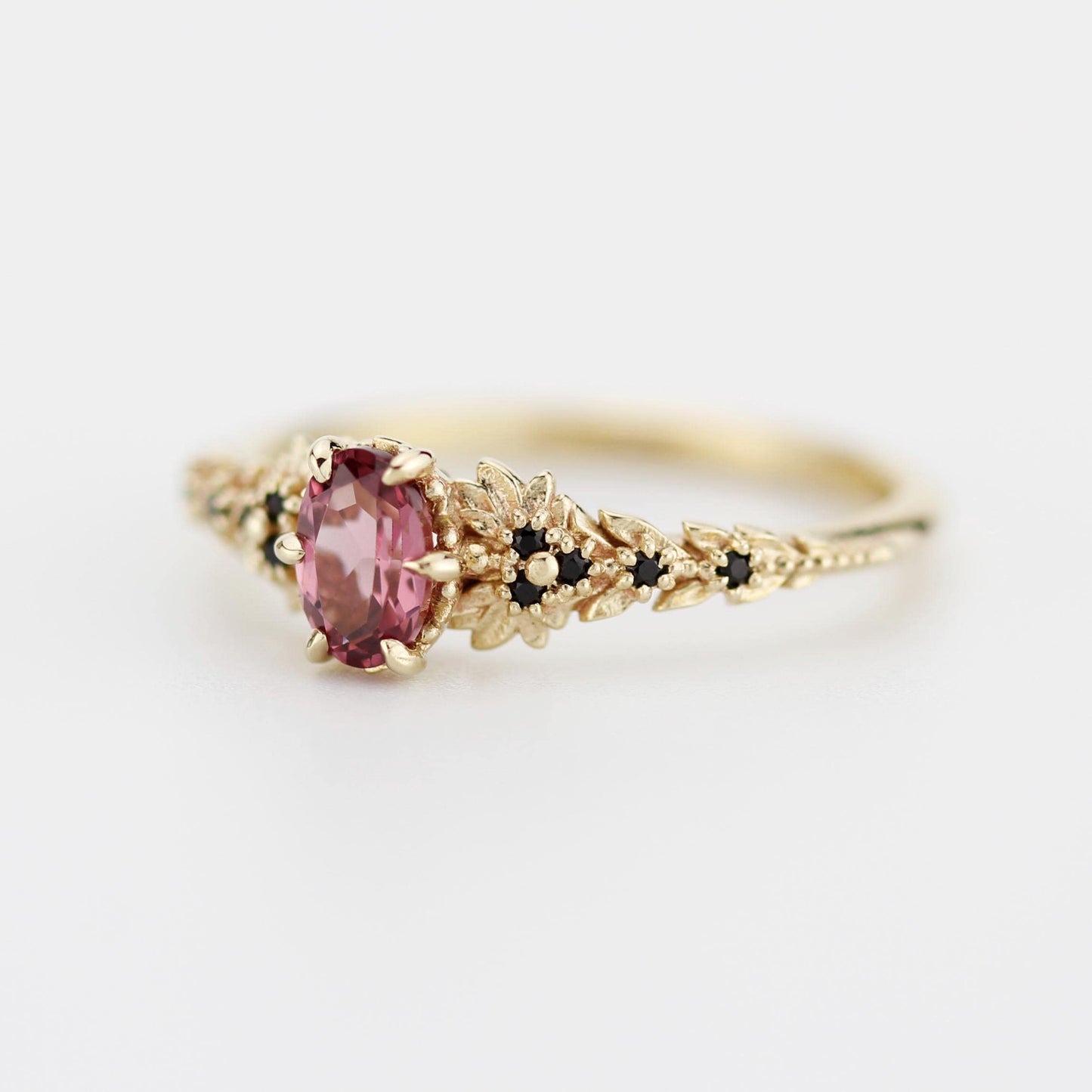 Rhodolite Garnet Engagement Ring in 18k Gold, Black Diamond Leaf Band, Oval Garnet Petal Setting, Handmade Nature-Inspired Jewelry