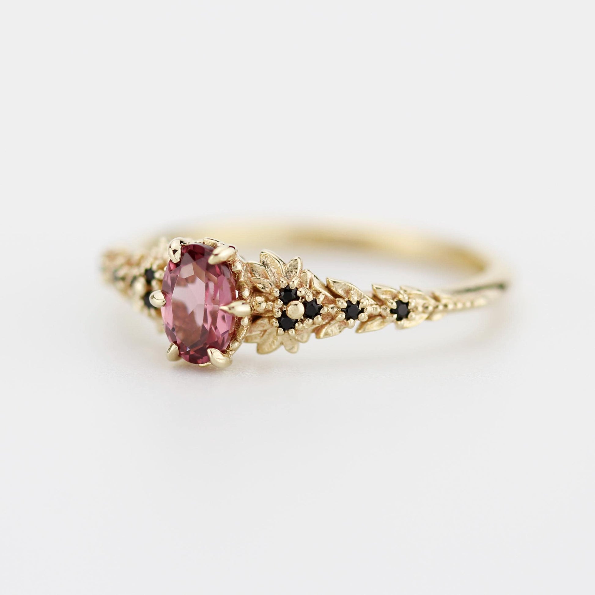 Rhodolite Garnet Engagement Ring in 18k Gold, Black Diamond Leaf Band, Oval Garnet Petal Setting, Handmade Nature-Inspired Jewelry