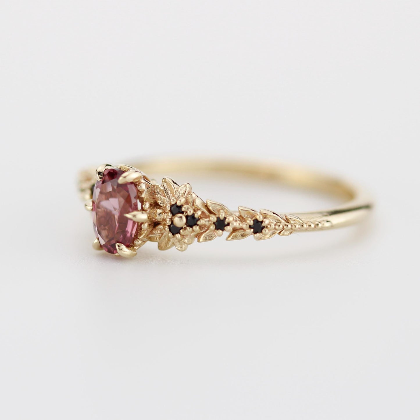Rhodolite Garnet Engagement Ring in 18k Gold, Black Diamond Leaf Band, Oval Garnet Petal Setting, Handmade Nature-Inspired Jewelry