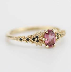 Rhodolite Garnet Engagement Ring in 18k Gold, Black Diamond Leaf Band, Oval Garnet Petal Setting, Handmade Nature-Inspired Jewelry
