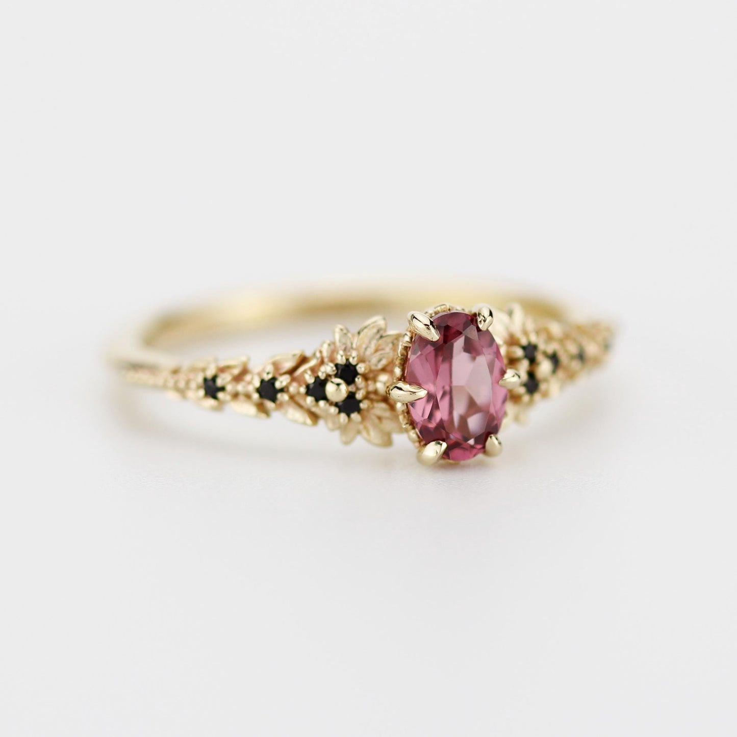 Rhodolite Garnet Engagement Ring in 18k Gold, Black Diamond Leaf Band, Oval Garnet Petal Setting, Handmade Nature-Inspired Jewelry