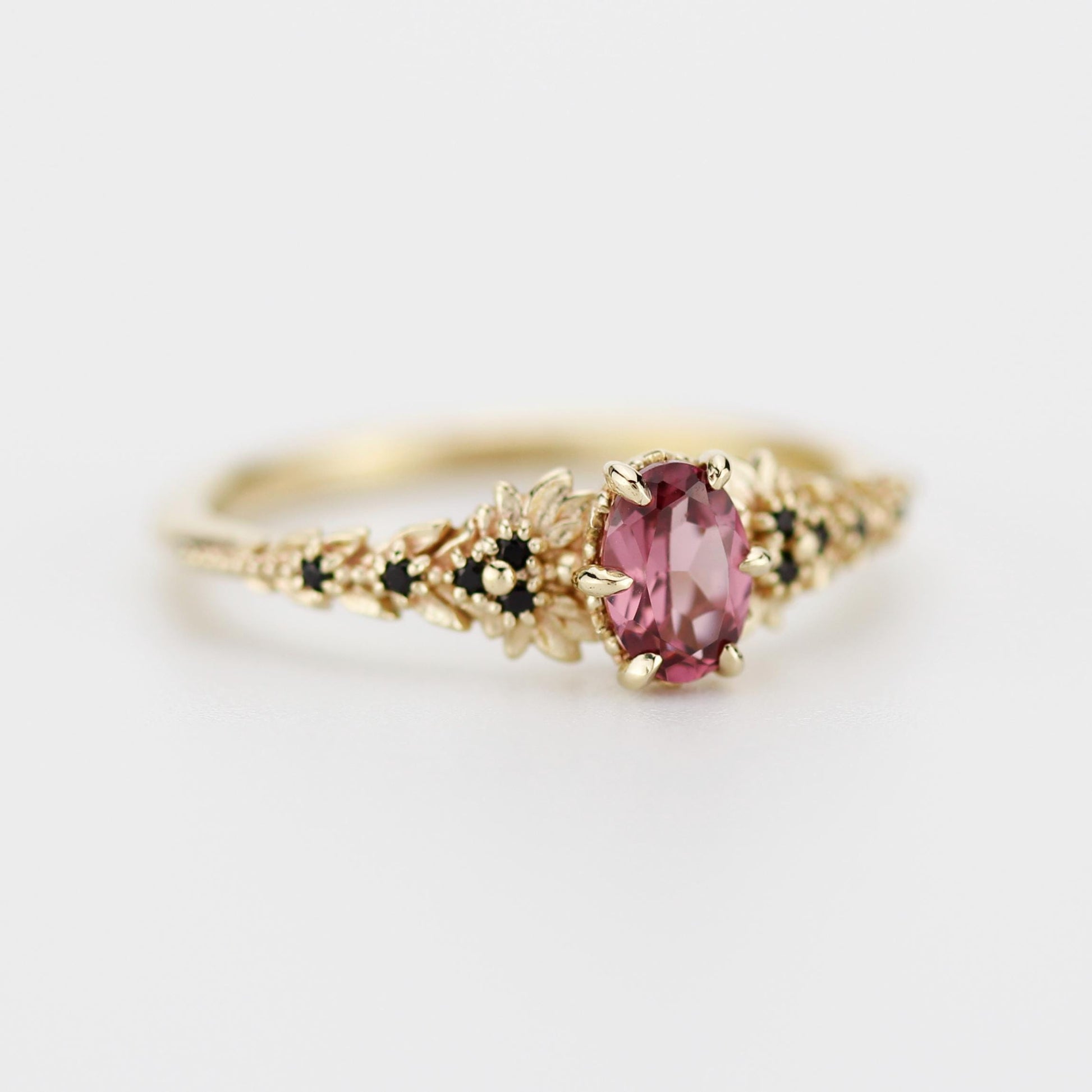 Rhodolite Garnet Engagement Ring in 18k Gold, Black Diamond Leaf Band, Oval Garnet Petal Setting, Handmade Nature-Inspired Jewelry