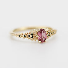 Load image into Gallery viewer, Rhodolite Garnet Engagement Ring in 18k Gold, Black Diamond Leaf Band, Oval Garnet Petal Setting, Handmade Nature-Inspired Jewelry