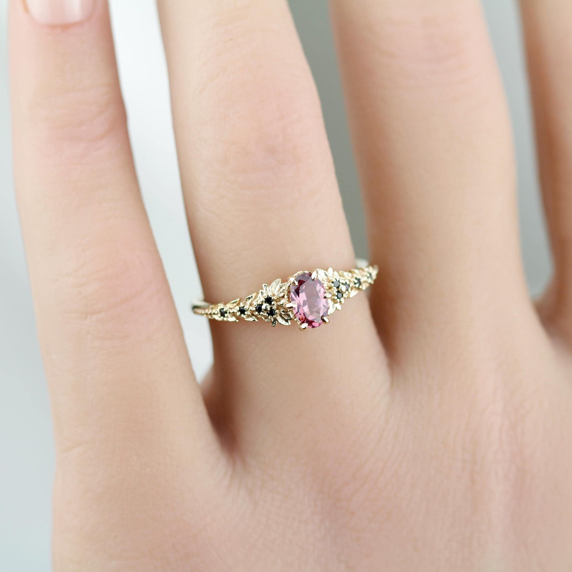 Rhodolite Garnet Engagement Ring in 18k Gold, Black Diamond Leaf Band, Oval Garnet Petal Setting, Handmade Nature-Inspired Jewelry