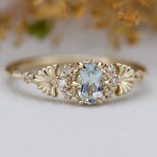 Baroque style - Engagement Ring with Oval Aquamarine and Diamonds