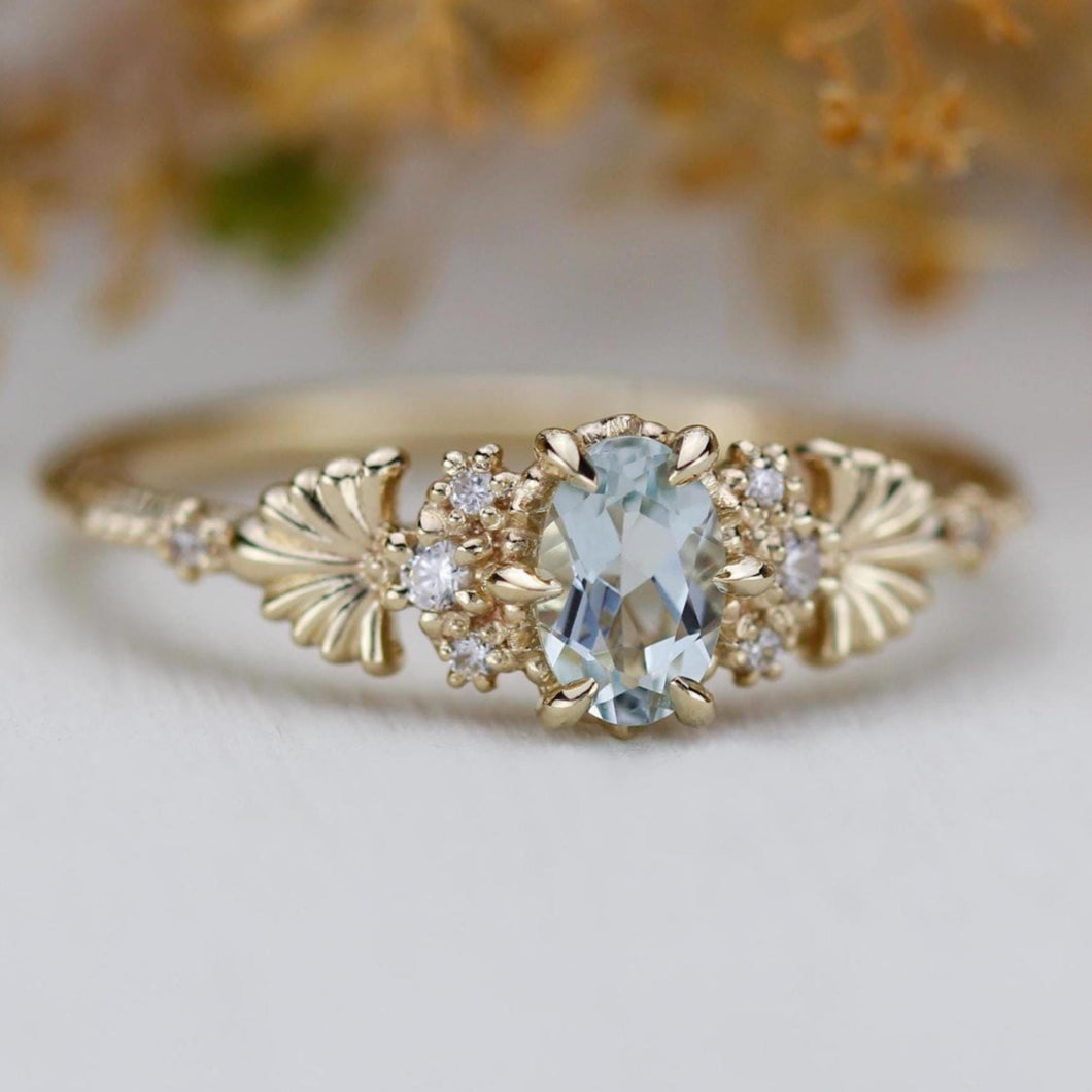 Baroque style - Engagement Ring with Oval Aquamarine and Diamonds