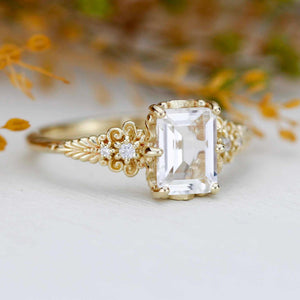 18k gold emerald cut moissanite and diamond engagement ring vintage style