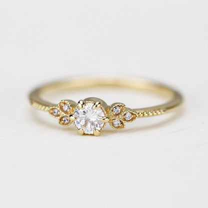 18k gold art deco leaf ring with a round lab grown diamond, front view, closer