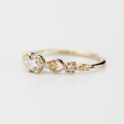 18k gold baroque scroll ring with a round lab grown diamond, side view