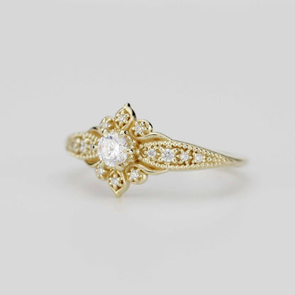 18k gold Dhalia ring with a round lab grown diamond, side view