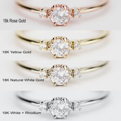 18k gold three stone ring with a round lab grown diamond, yellow, rose, natural white and rhodium