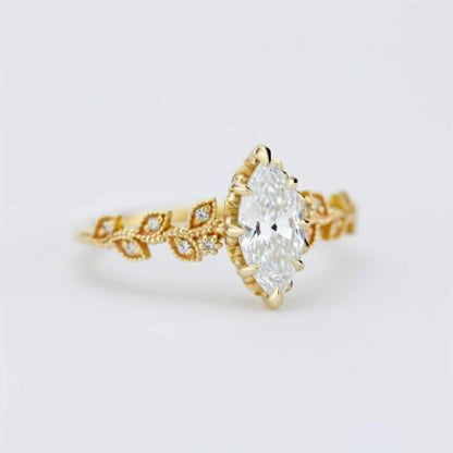 18k gold leaf ring with a 1 carat, 10x5 mm marquise lab grown diamond