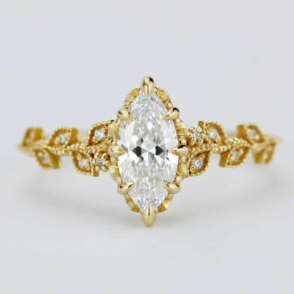 18k gold leaf ring with a 1 carat, 10x5 mm marquise lab grown diamond