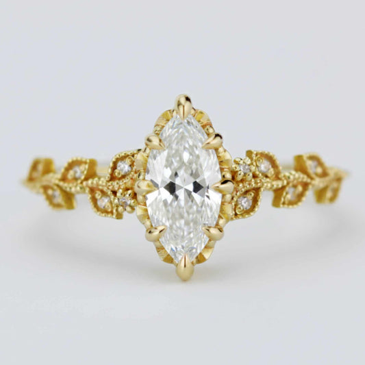 18k gold leaf ring with a 1 carat, 10x5 mm marquise lab grown diamond