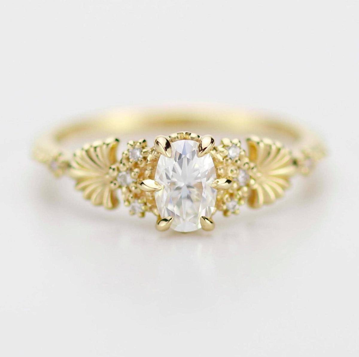 18k gold art nouveau ring with an oval lab grown diamond, about 0.45 carat, 6x4 mm