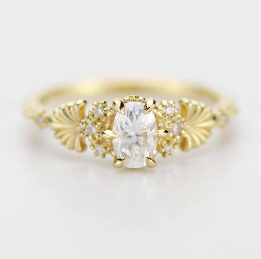 18k gold art nouveau ring with an oval lab grown diamond, about 0.45 carat, 6x4 mm