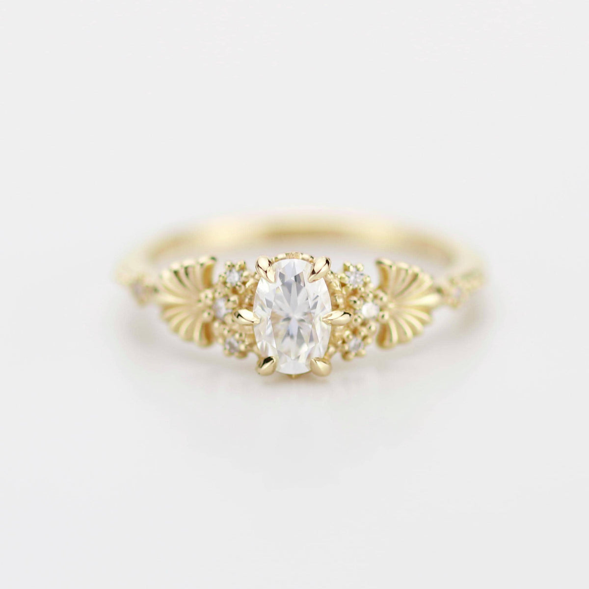 18k gold art nouveau ring with an oval lab grown diamond, front view