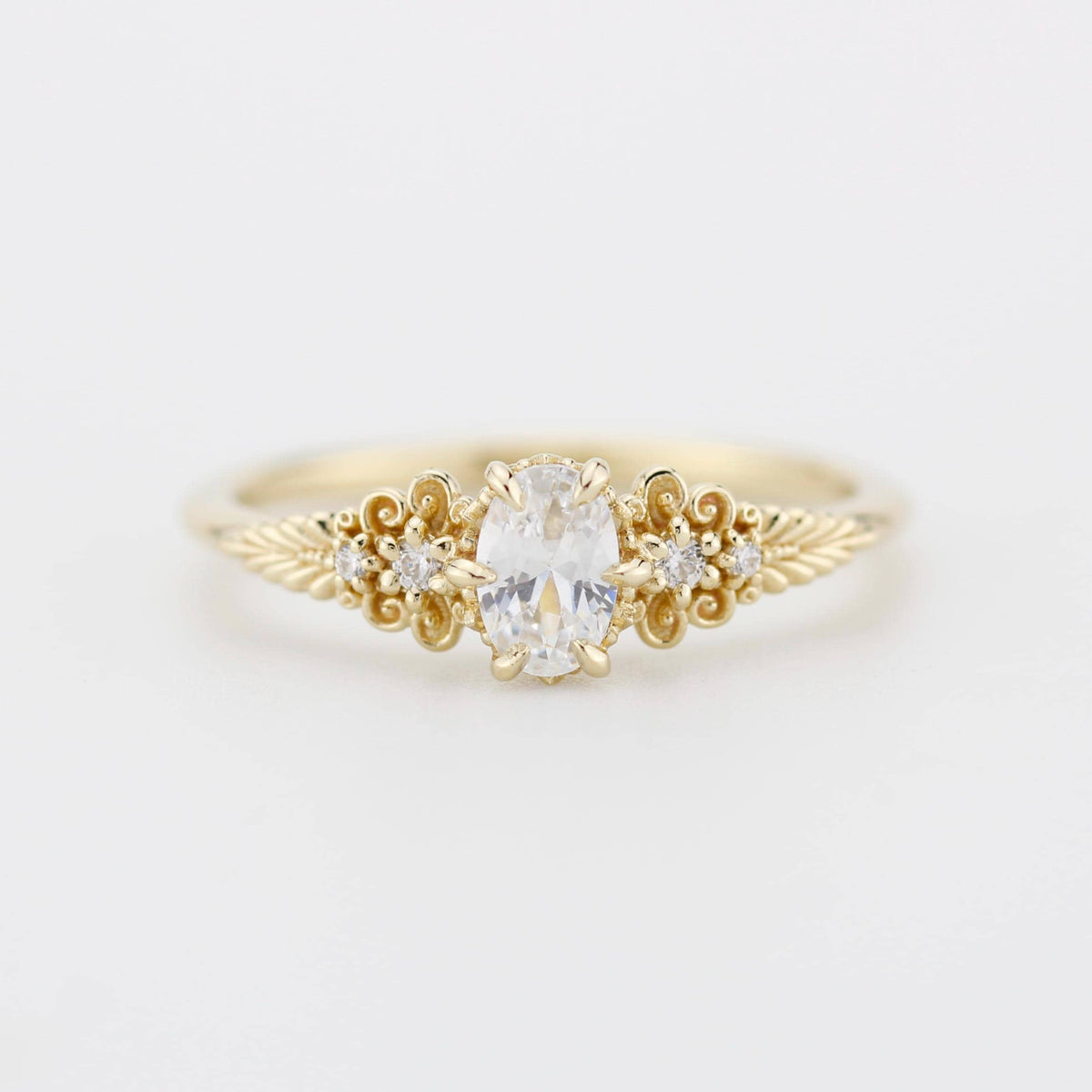18k gold Art Nouveau leaf-band ring with an oval lab grown diamond, front view