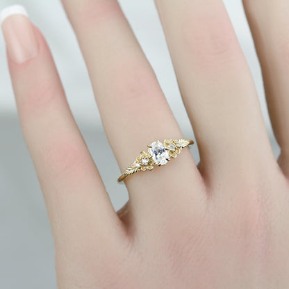 18k gold Art Nouveau leaf-band ring with an oval lab grown diamond, worn on the hand