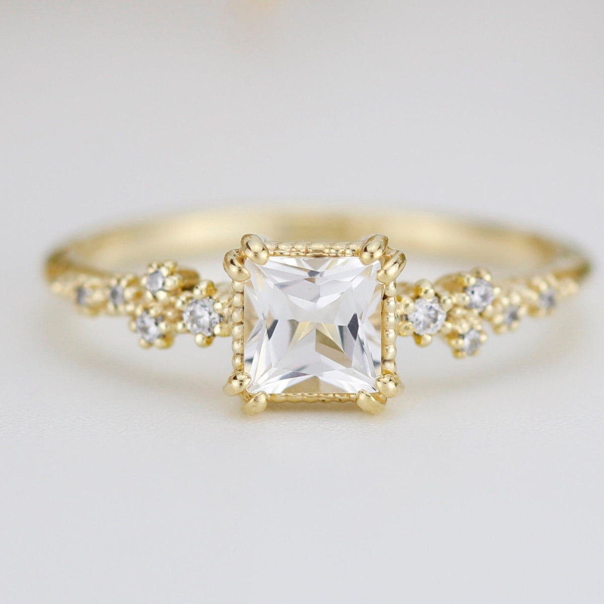 18k gold floral ring with a 5x5 mm princess cut lab grown diamond, 0.8 carat