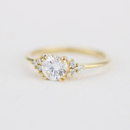 18k gold split-prong ring with a round lab grown diamond, angled from the other side