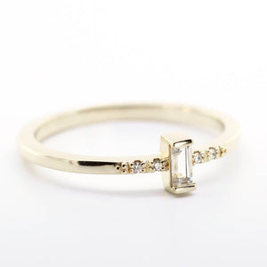 simple baguette ring with side stones | white topaz and diamond engagement ring - NOOI JEWELRY